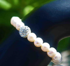 Pulsera de Perlas de rio con Dije de Cristal Pulsera de Perlas de rio con Dije de Cristal