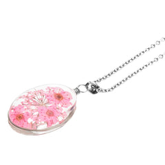 Collar con Flores Naturales Encapsuladas en Cristal Libela y Cadena de Acero Inoxidable Collar con Flores Naturales Encapsuladas en Cristal Libela y Cadena de Acero Inoxidable