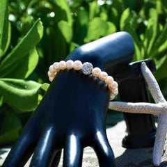 Pulsera de Perlas de rio con Dije de Cristal Pulsera de Perlas de rio con Dije de Cristal