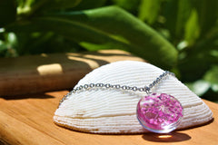 Collar con flores encapsuladas en cristal Collar con flores encapsuladas en cristal