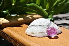 Collar con flores encapsuladas en cristal Collar con flores encapsuladas en cristal