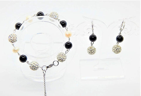 Conjunto de joyas de obsidiana, perlas y cristales